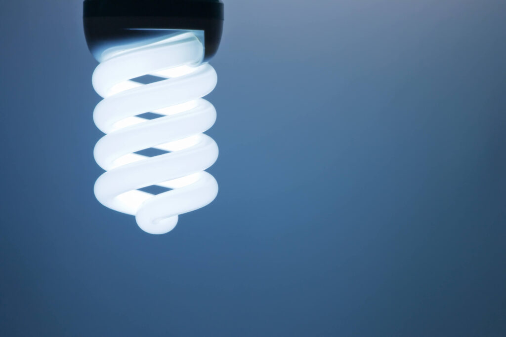 Energy saving lightbulb on a dark blue background How to better manage safety stock inventory levels