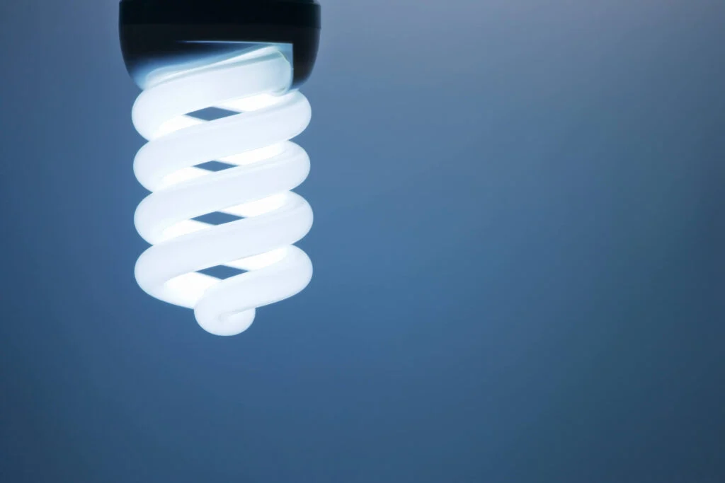 Energy saving lightbulb on a dark blue background How to better manage safety stock inventory levels