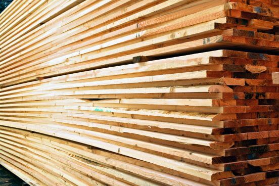 Construction Materials - stacked lumber