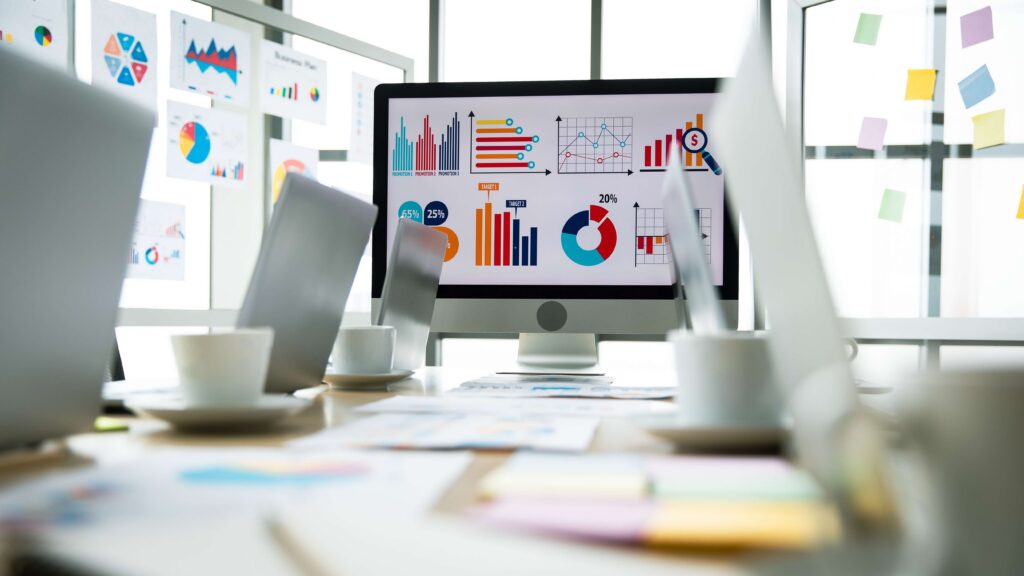 Laptop computer colorful post it paper report data graph chart documents on table in conference meeting room 

Trends: Whereas seasonality effects demand on a regular basis, causing peaks and troughs, a trend will move demand in one direction over a period of time.

