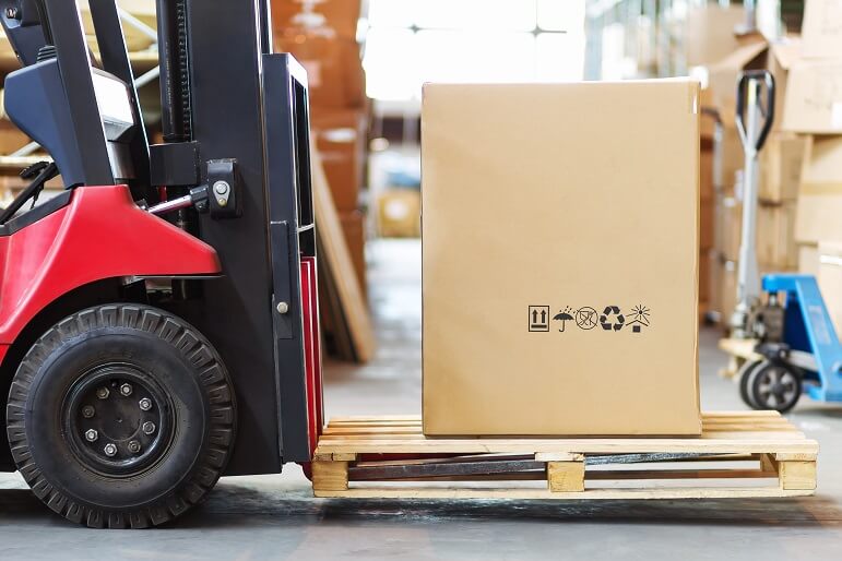 Forklift moving boxes around a warehouse warehouse delivery big data and inventory management 