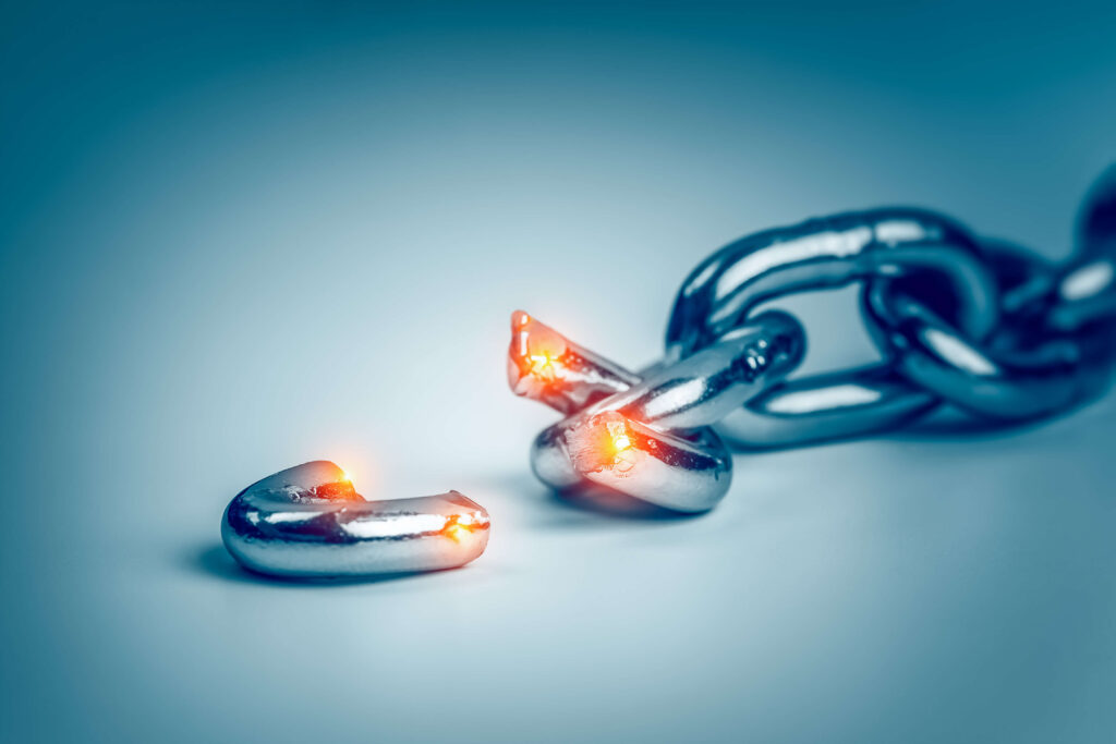 Broken chain with the broken link glowing red at the ends improving inventory planning during times of disruption