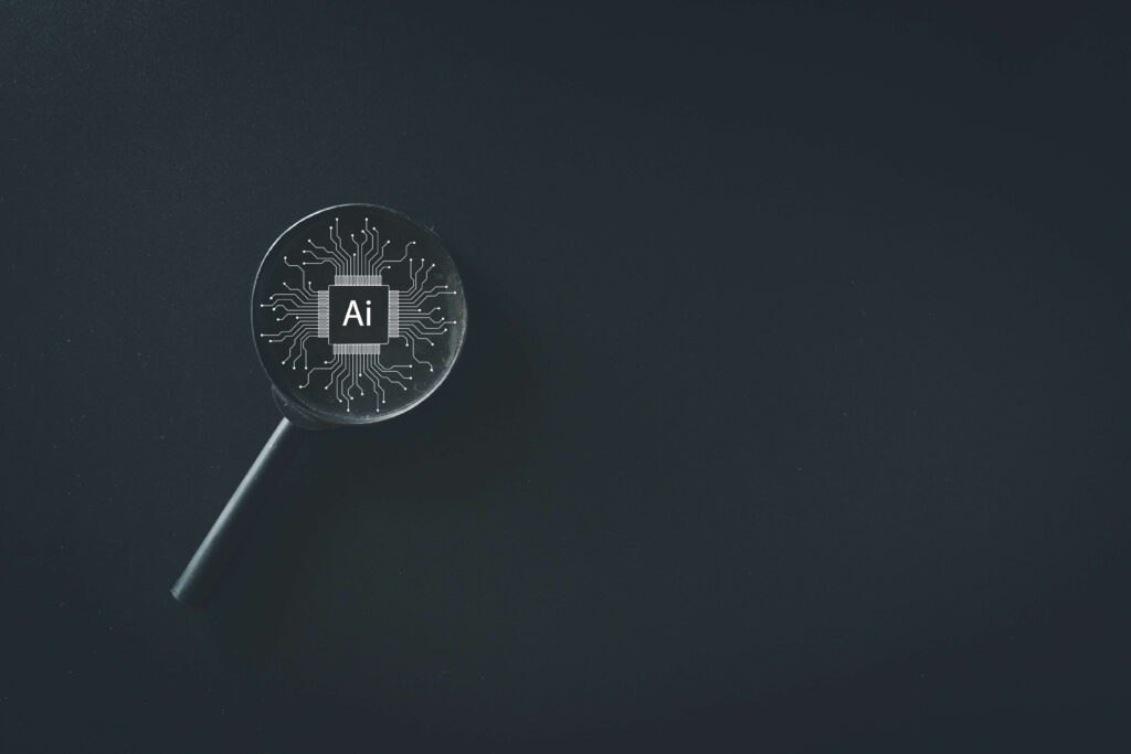 A magnifying glass over the top of a a box with AI in the middle what is artificial intelligence? AI and inventory management