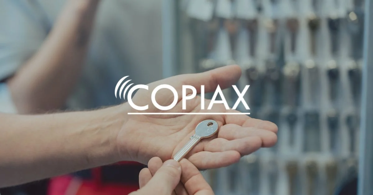 Copiax logo ovanpå en nyckel.