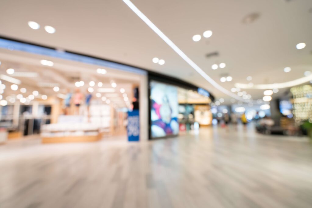 Blurred image of a shopping centre

The bullwhip effect in supply chain management occurs when small changes in customer demand are amplified as orders move upstream from retailers to wholesalers, manufacturers, and suppliers. Instead of aligning with actual demand, each stage adds safety buffers (safety stock), reacts to limited information, and overcorrects, thereby increasing variability rather than reducing it.