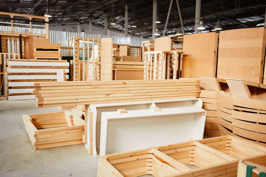 Wooden furniture parts in a warehouse
Make-to-order means production begins from scratch once a product is confirmed, using the necessary, on-hand raw materials. Those raw materials are at the decoupling point.